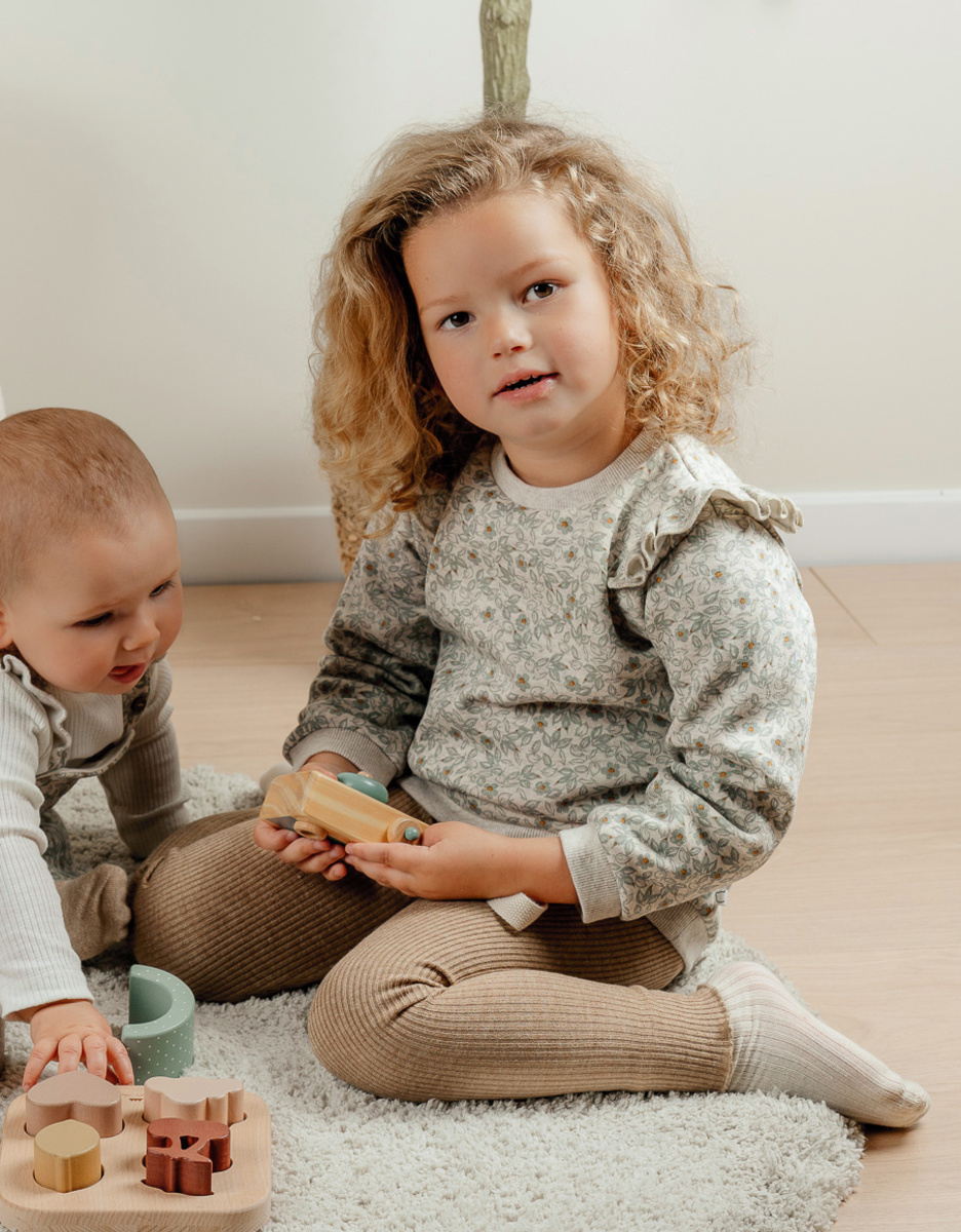 Set bloemen sweater en geribde legging
