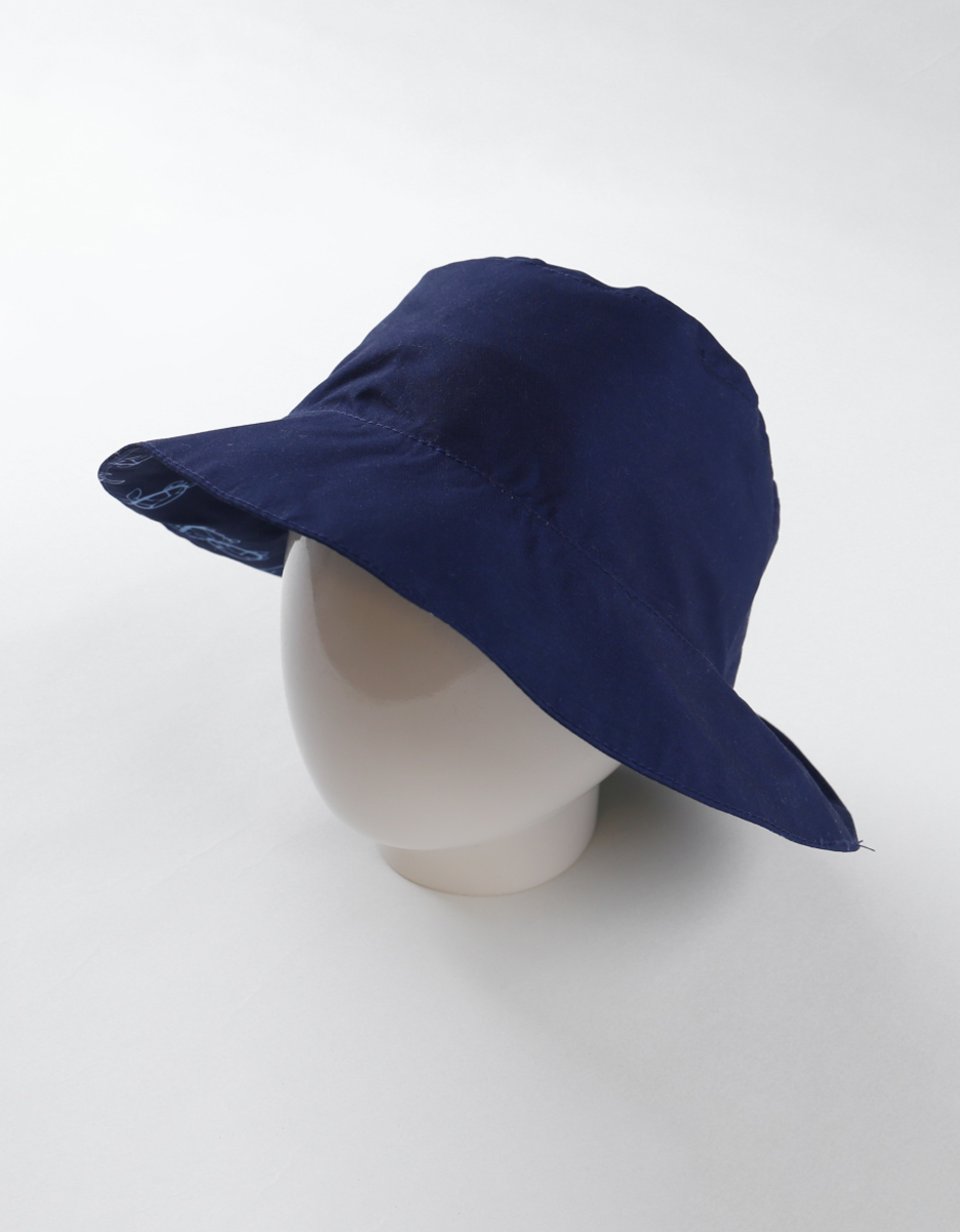 Chapeau réversible à imprimé tortue, bleu marine/rouge