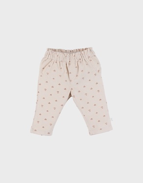 Corduroy trousers with floral print in blush pink
