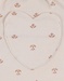 Corduroy trousers with floral print in blush pink
