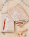 Veloudoux dino baby health book cover, beige
